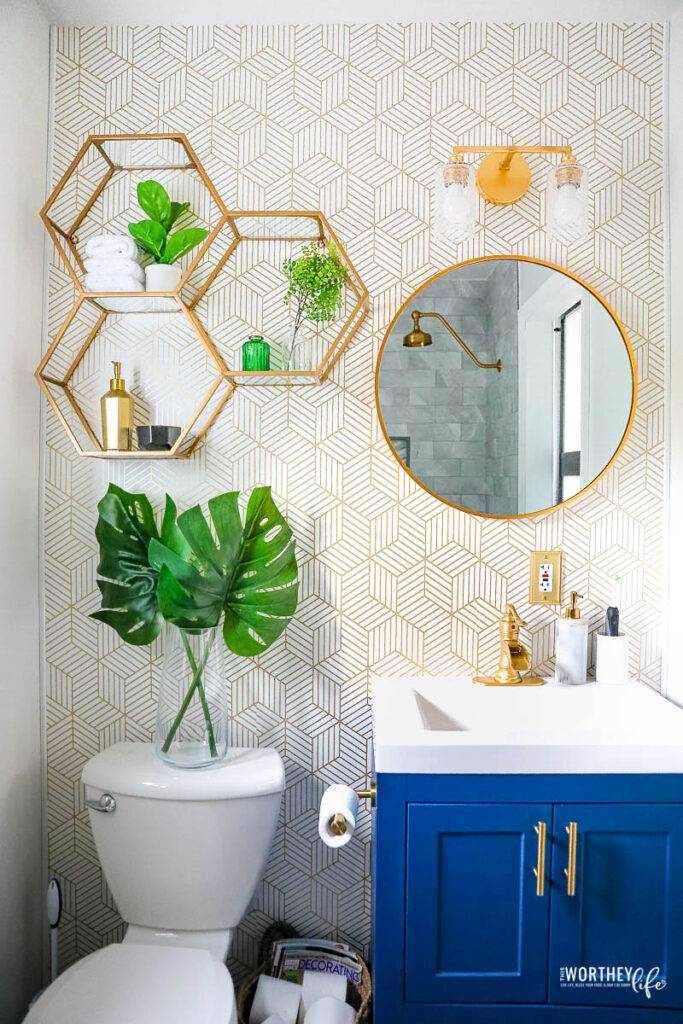 https://www.awortheyread.com/wp-content/uploads/2020/06/gold-grey-blue-small-bathroom-makeover-10-683x1024.jpg