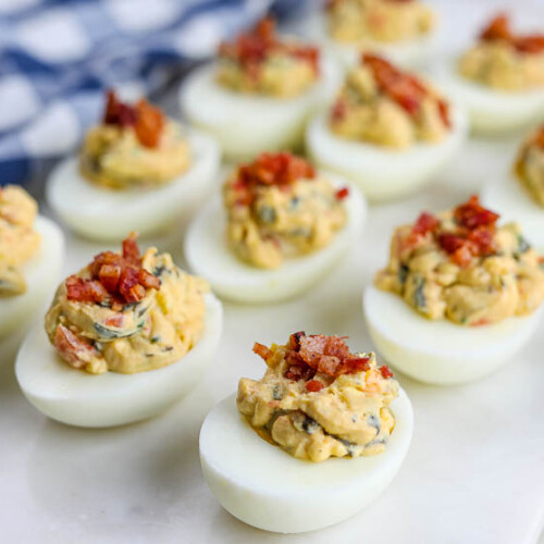 https://www.awortheyread.com/wp-content/uploads/2020/10/Loaded-Deviled-Eggs-Bacon-15-500x500.jpg