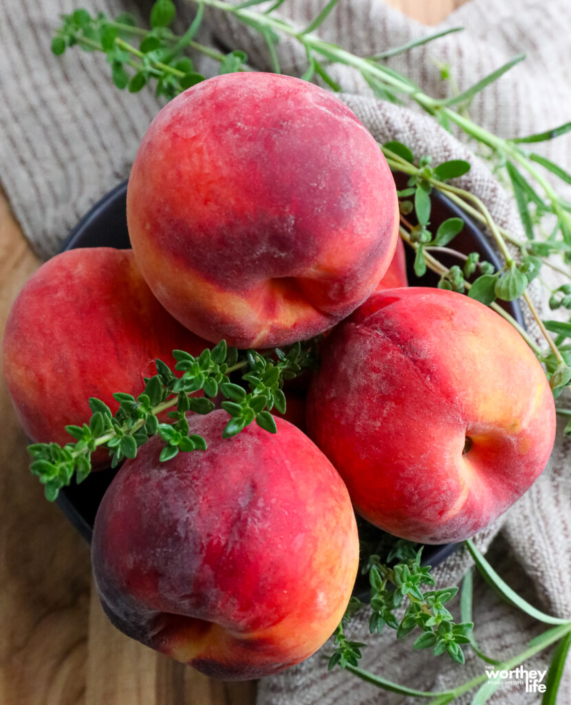 fresh peaches in a bowl