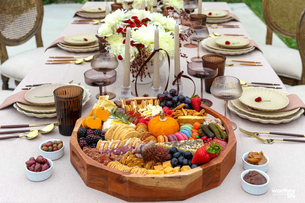 fall tablescape with grazing platter filled with fall seasonal food