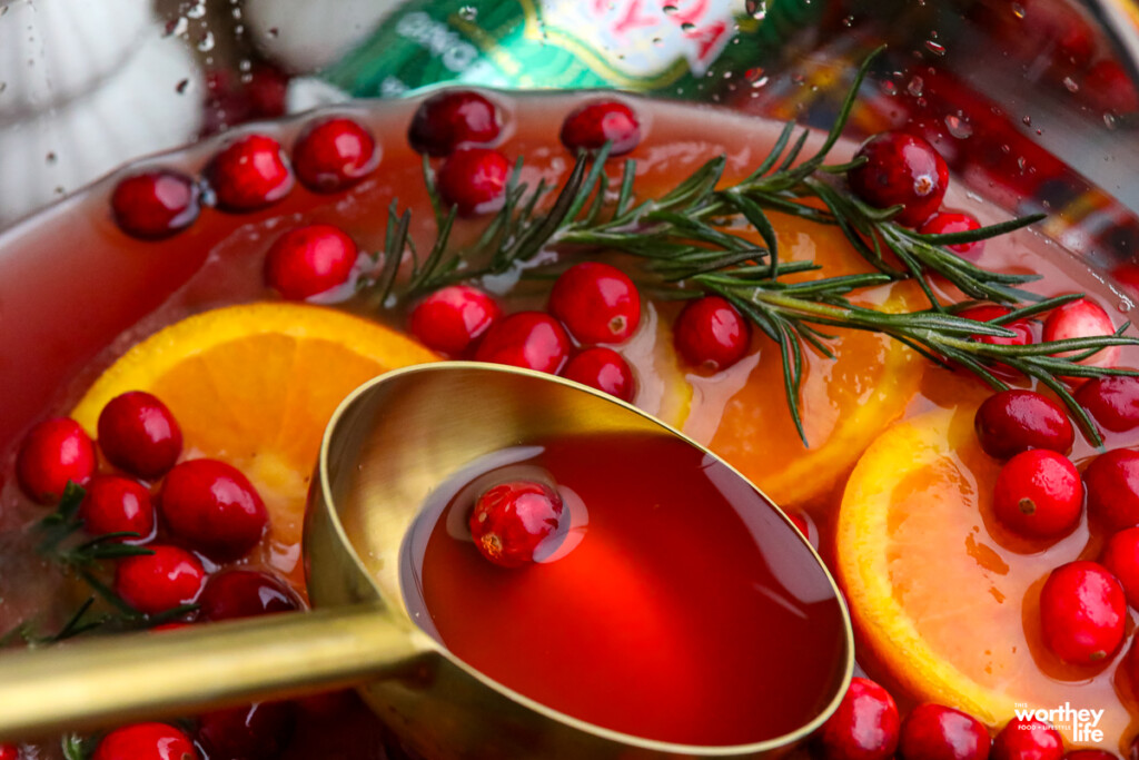 ladle dipping into a punch bowl 